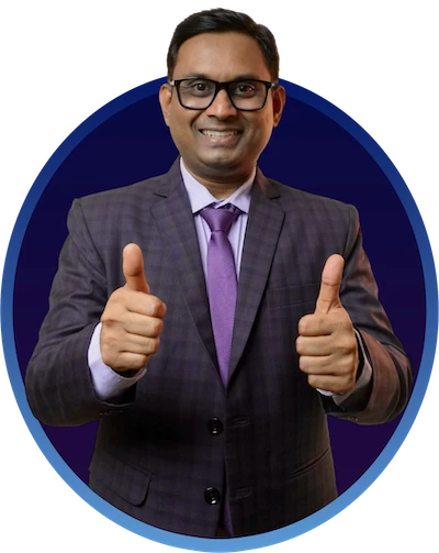 Ashish Mudra giving a double thumbs-up in a business suit, symbolizing confidence, trust, and positive sales growth.