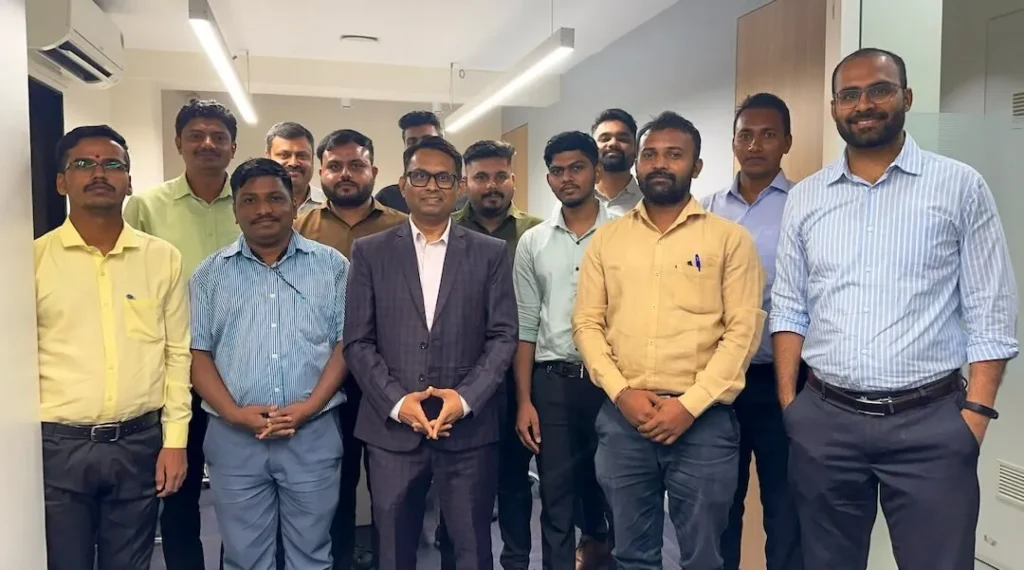 Sales transformation coach Ashish Mudra with participants after a successful business growth training session in Mumbai.
